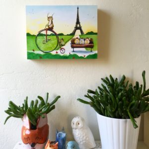 Herbert the Owl Pedals Through Paris on a wall