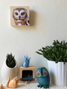 Print of saw whet owl by maggie hurley on a wall