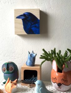 Raven painting print on wood by Maggie Hurley. Bird art hanging on a wall