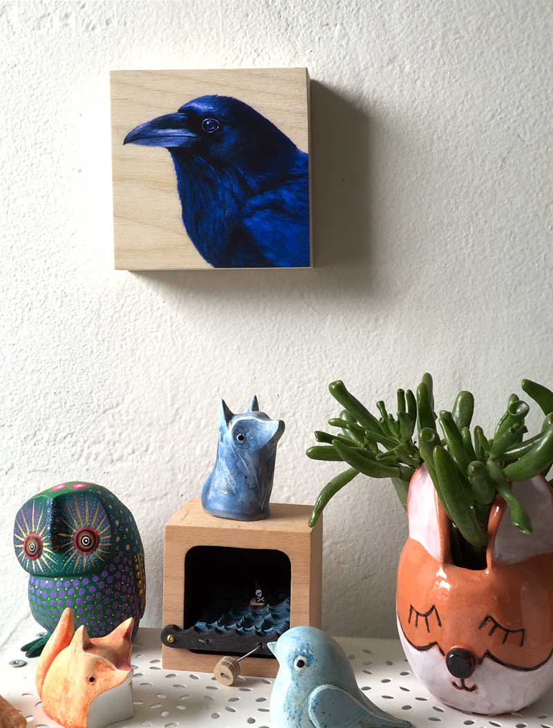 Raven painting print on wood by Maggie Hurley. Bird art hanging on a wall