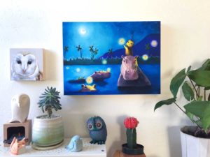 Herbert the Owl and the Happy hippos. Art on wood hung on wall