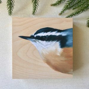 Painting of a red-breasted nuthatch on a wood panel