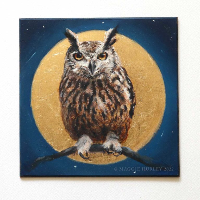 Eurasian eagle-owl with a moon and night sky